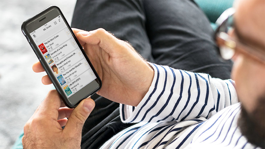 Man scrolling book list in EasyReader App on a smartphone
